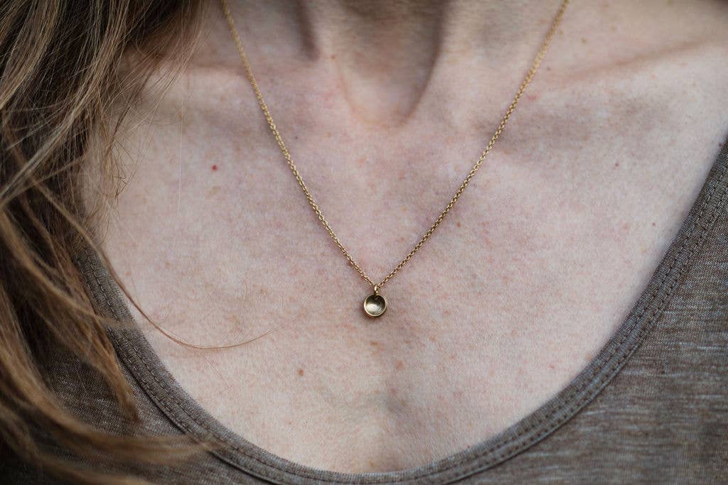 Tiny brass bowl necklace